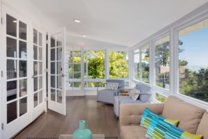 Bright solarium-style sunroom off the master suite. Casement Windows - Royal Windows